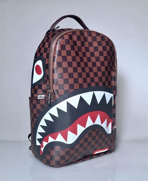 louis vuitton backpack with shark